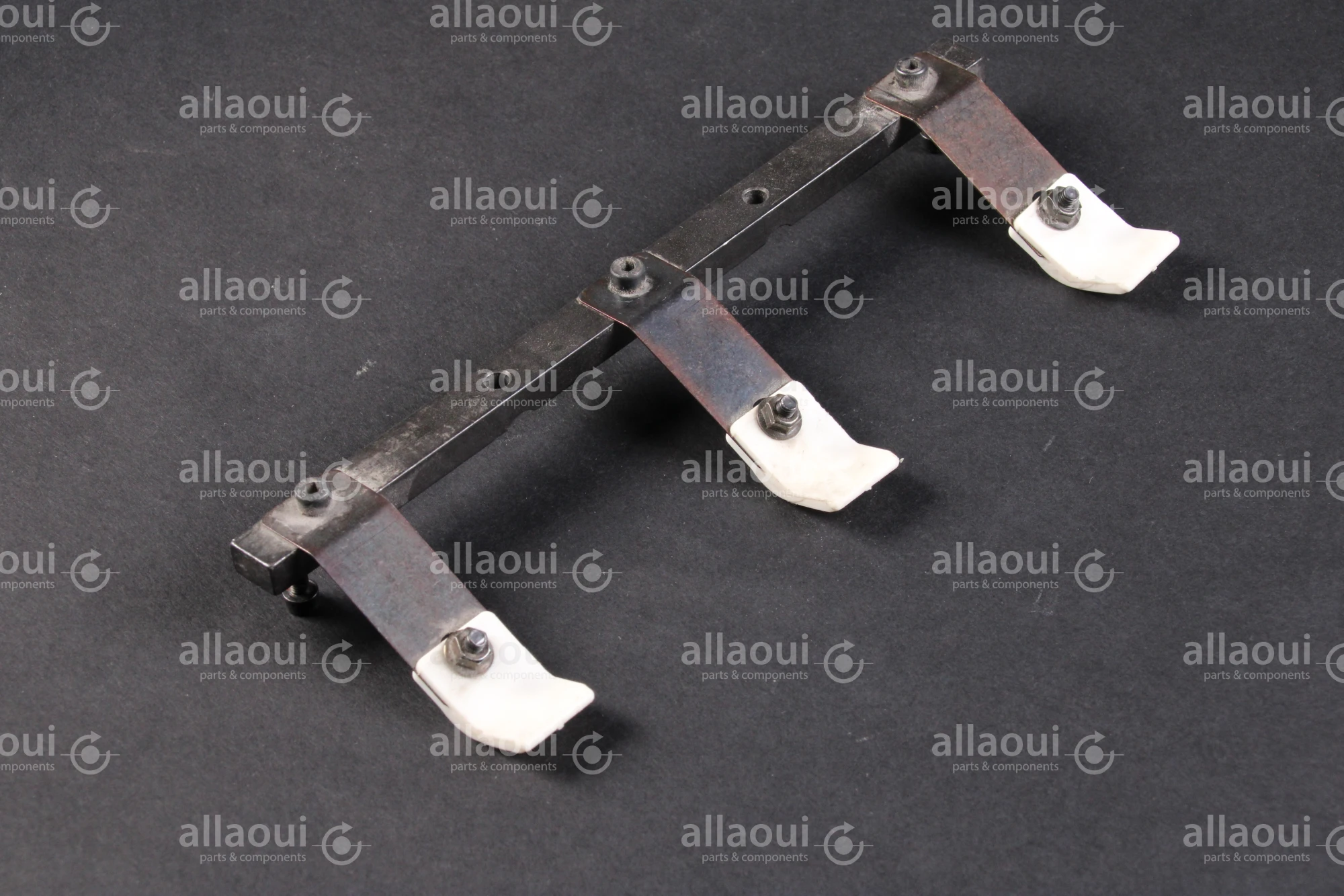 Müller Martini Support bar + vibrator part of stapler feeder 0316.3202.3